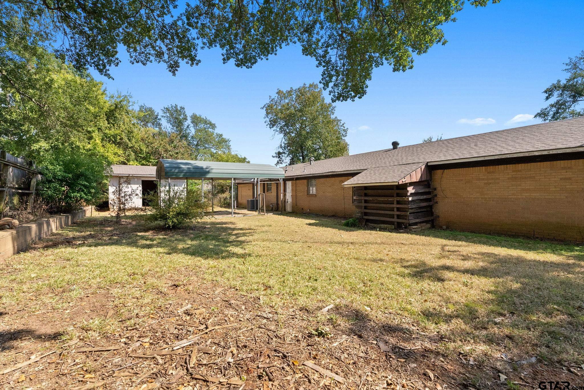 2002 Faulkner Street Tyler, TX 75701 - Photo 29 of 32 a front view of house with yard