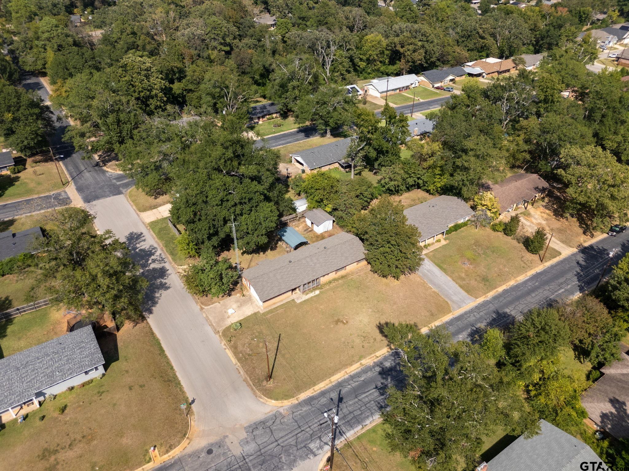 2002 Faulkner Street Tyler, TX 75701 - Photo 30 of 32 an aerial view of residential houses with outdoor space