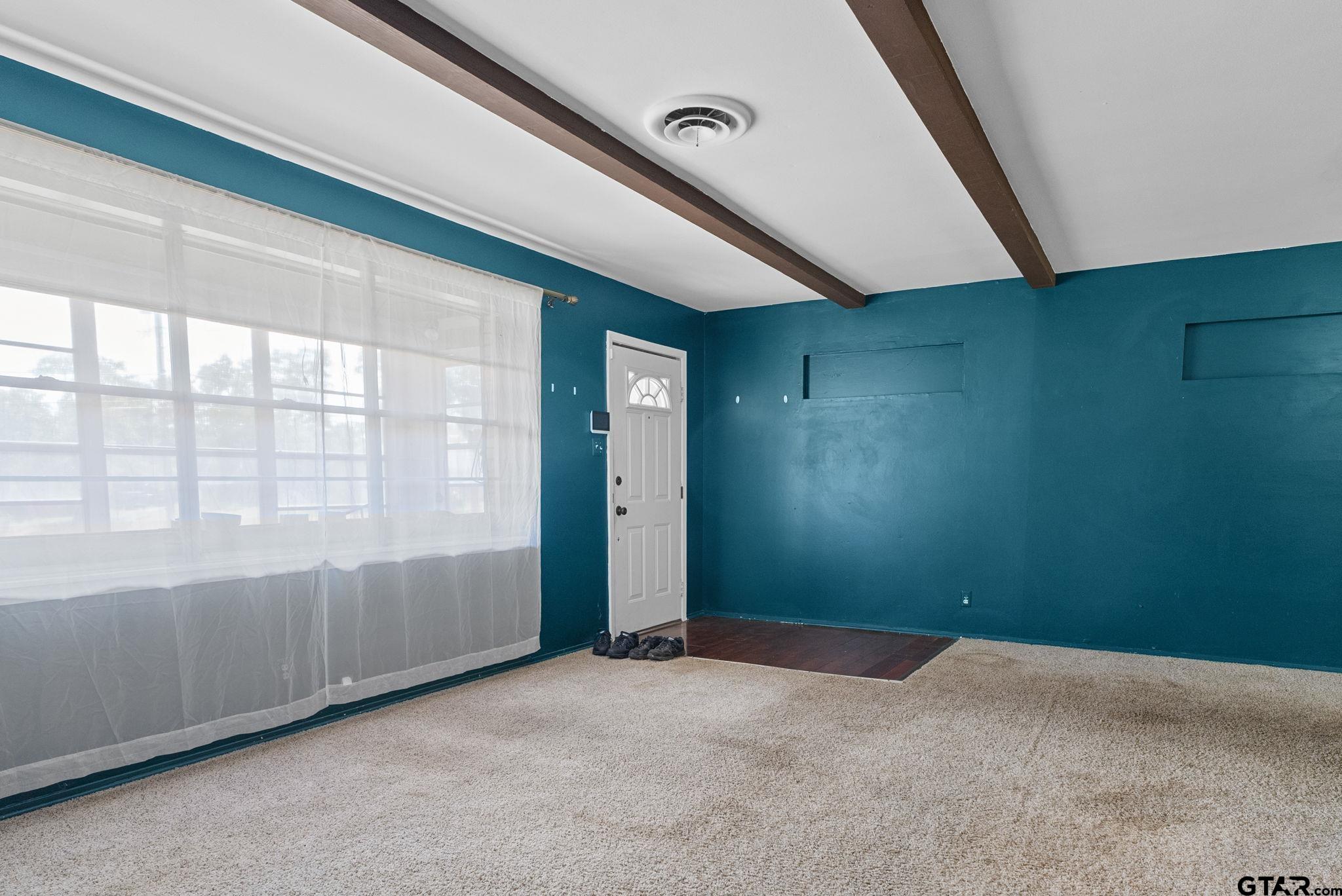 2002 Faulkner Street Tyler, TX 75701 - Photo 6 of 32 a view of an empty room with a window