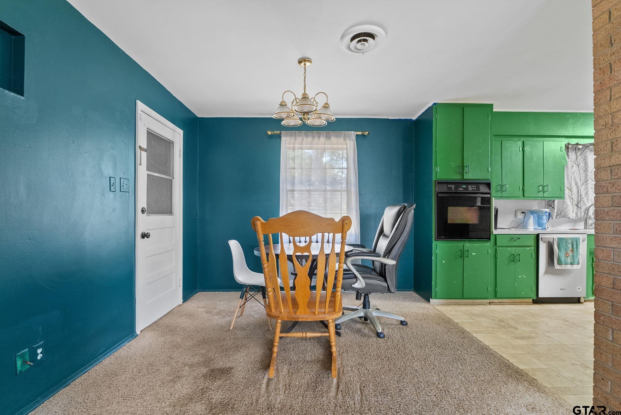 2002 Faulkner Street Tyler, TX 75701 - Photo 7 of 32 a dining room with furniture and a window