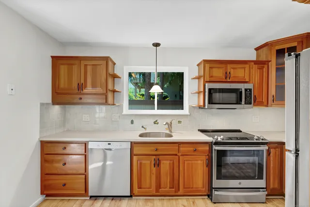 a picture of a bench in front of a wall