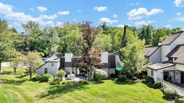 a view of a lake with a yard