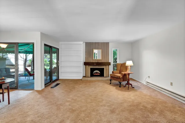 a view of a livingroom with furniture and a couch