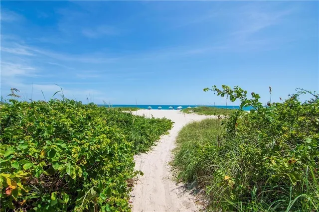 a view of a lake with a yard