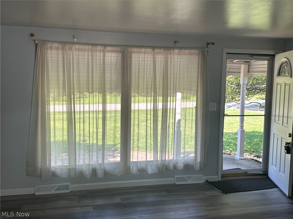 1001 Keefer Road Girard, OH 44420 - Photo 2 of 42 Entryway with a wealth of natural light and hardwood / wood-style floors