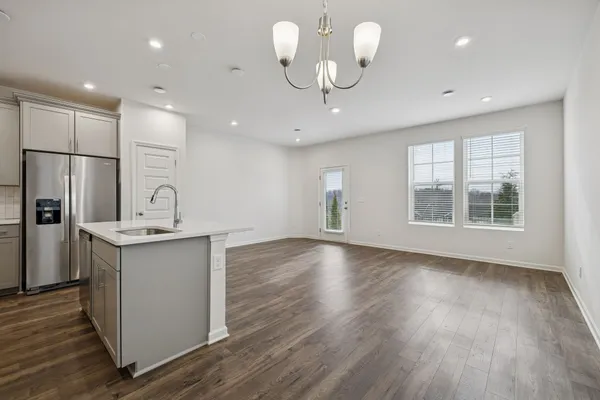a view of kitchen with wooden floor