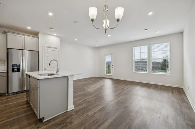 a view of kitchen with wooden floor