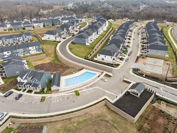 a view of a swimming pool with a terrace