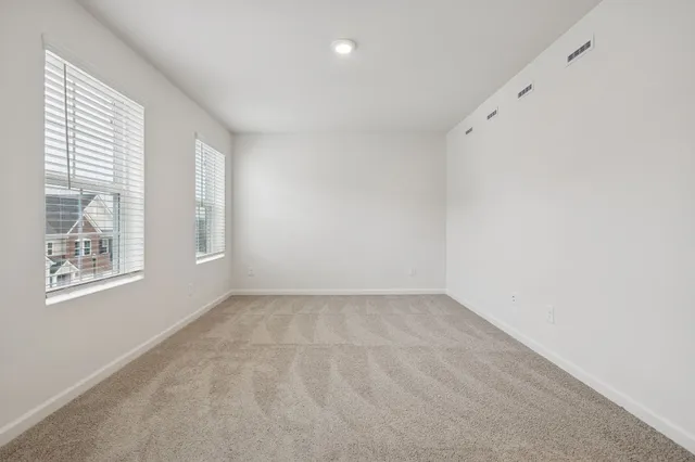 a bathroom with a double vanity sink a and mirror