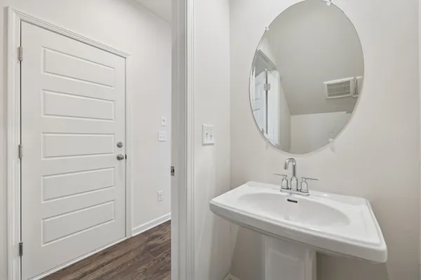 an empty room with closet area