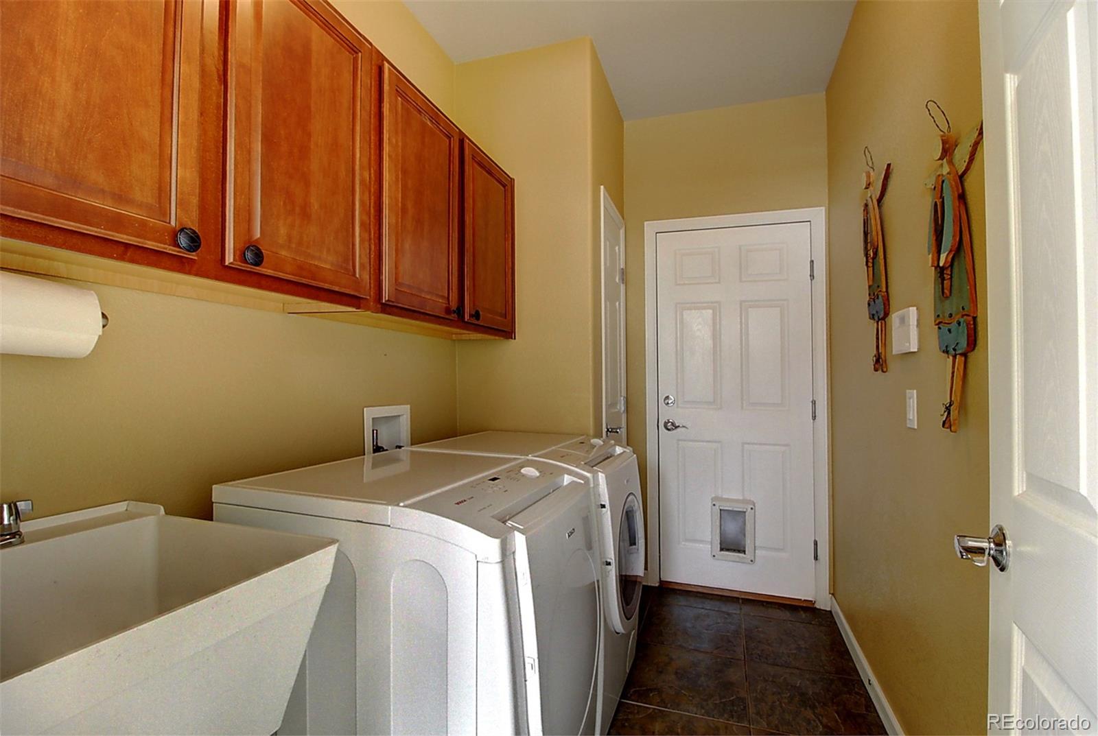 16330 Avalanche Run Broomfield, CO 80023 - Photo 14 of 39 a view of storage and utility room with washer and dryer