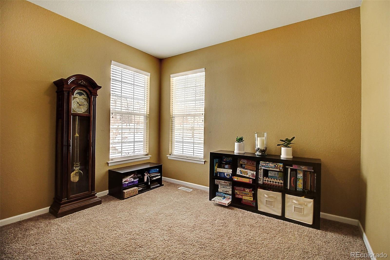 16330 Avalanche Run Broomfield, CO 80023 - Photo 15 of 39 a view of a livingroom with furniture and window