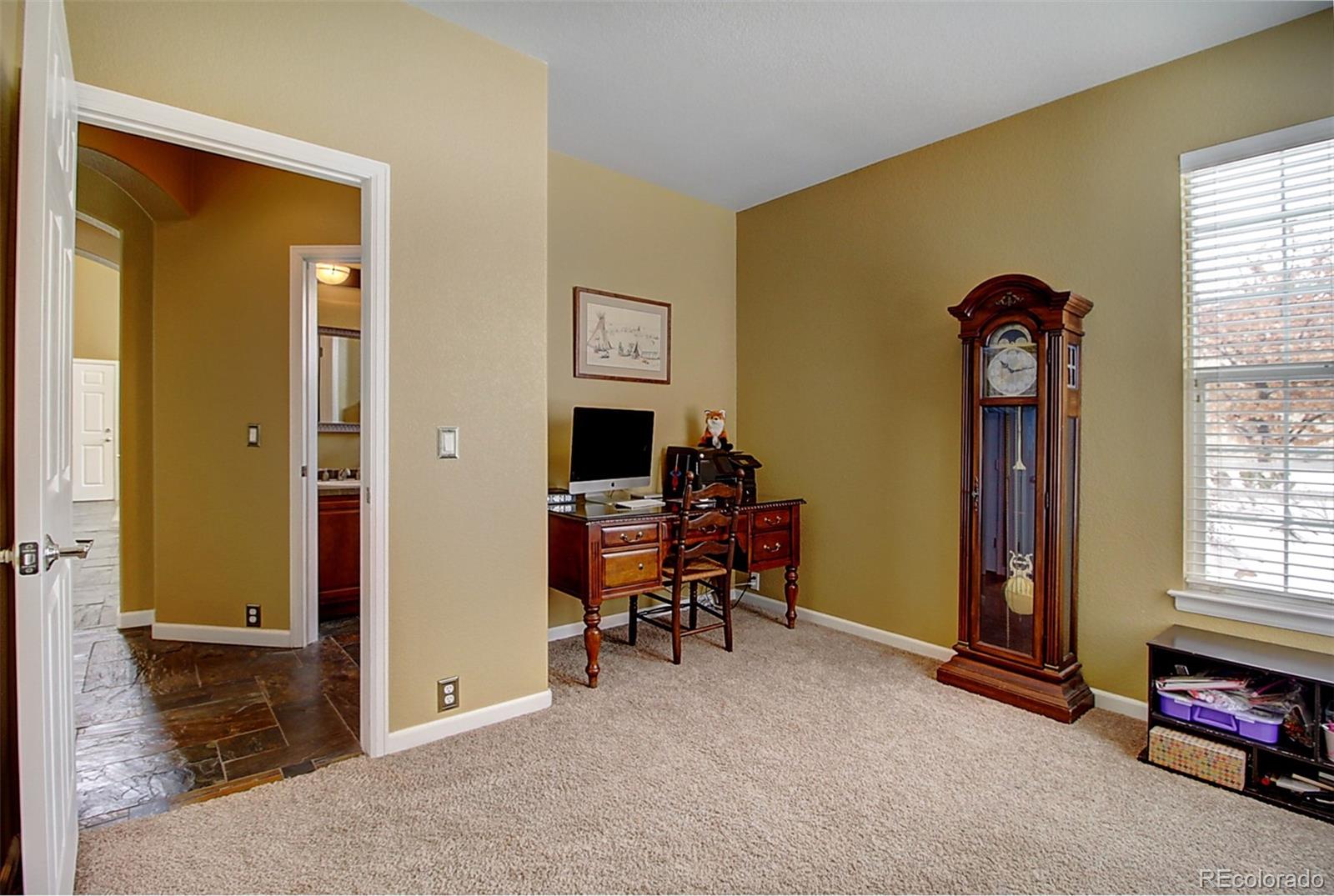 16330 Avalanche Run Broomfield, CO 80023 - Photo 16 of 39 a view of livingroom with furniture and window