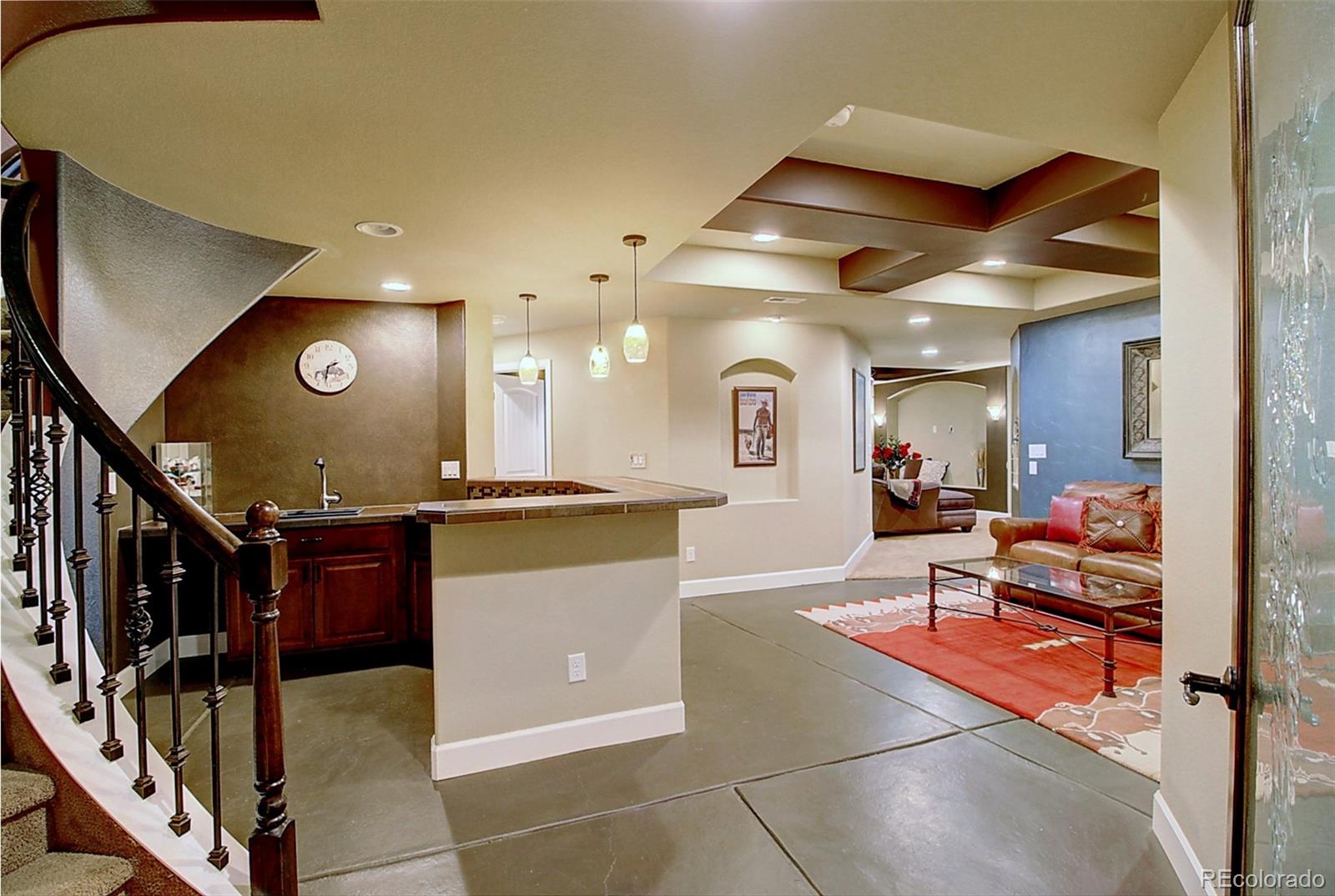 16330 Avalanche Run Broomfield, CO 80023 - Photo 18 of 39 a lobby with furniture and a potted plant