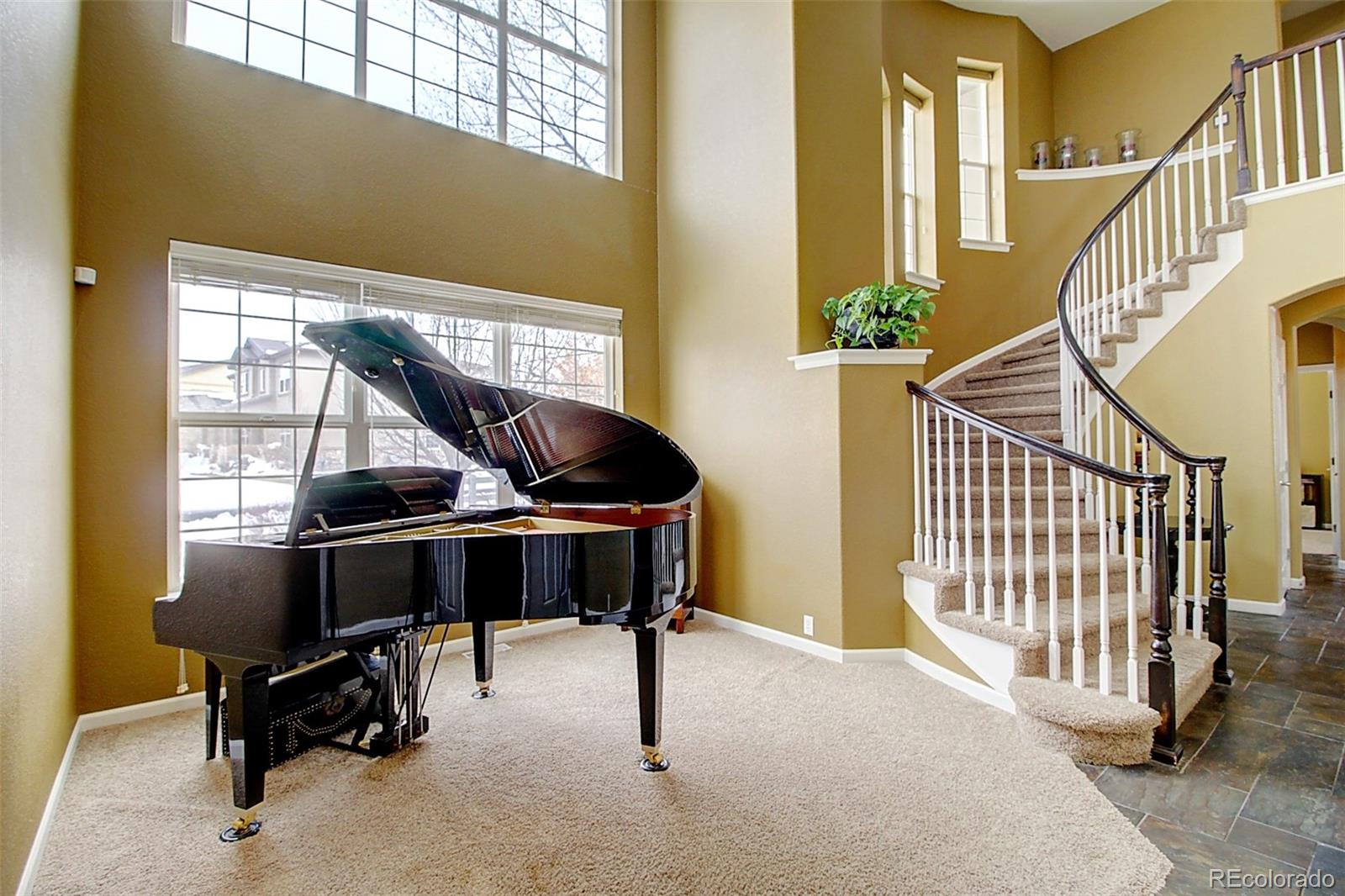 16330 Avalanche Run Broomfield, CO 80023 - Photo 2 of 39 a view of hall way with furniture