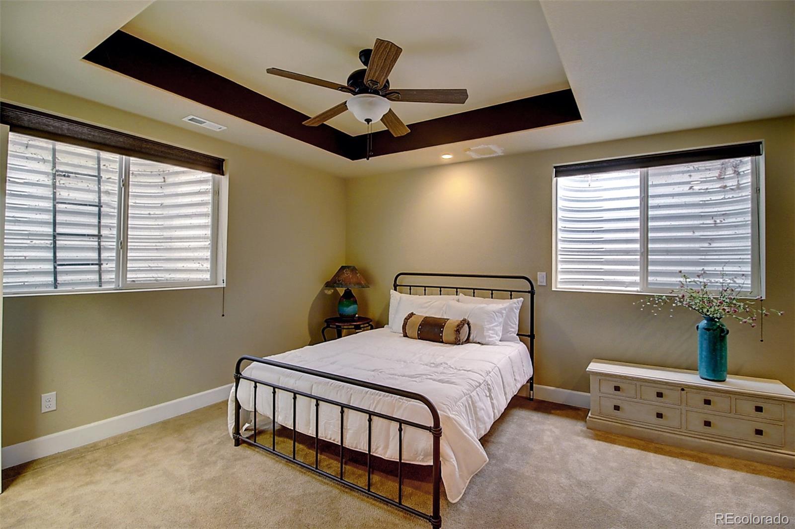 16330 Avalanche Run Broomfield, CO 80023 - Photo 22 of 39 a bedroom with a bed and a window