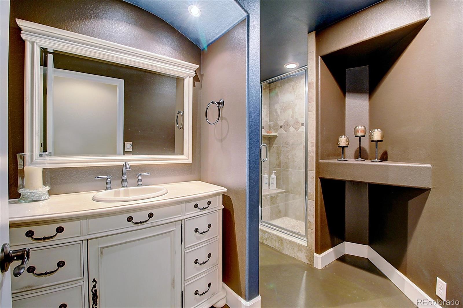 16330 Avalanche Run Broomfield, CO 80023 - Photo 25 of 39 a bathroom with a double vanity sink mirror and