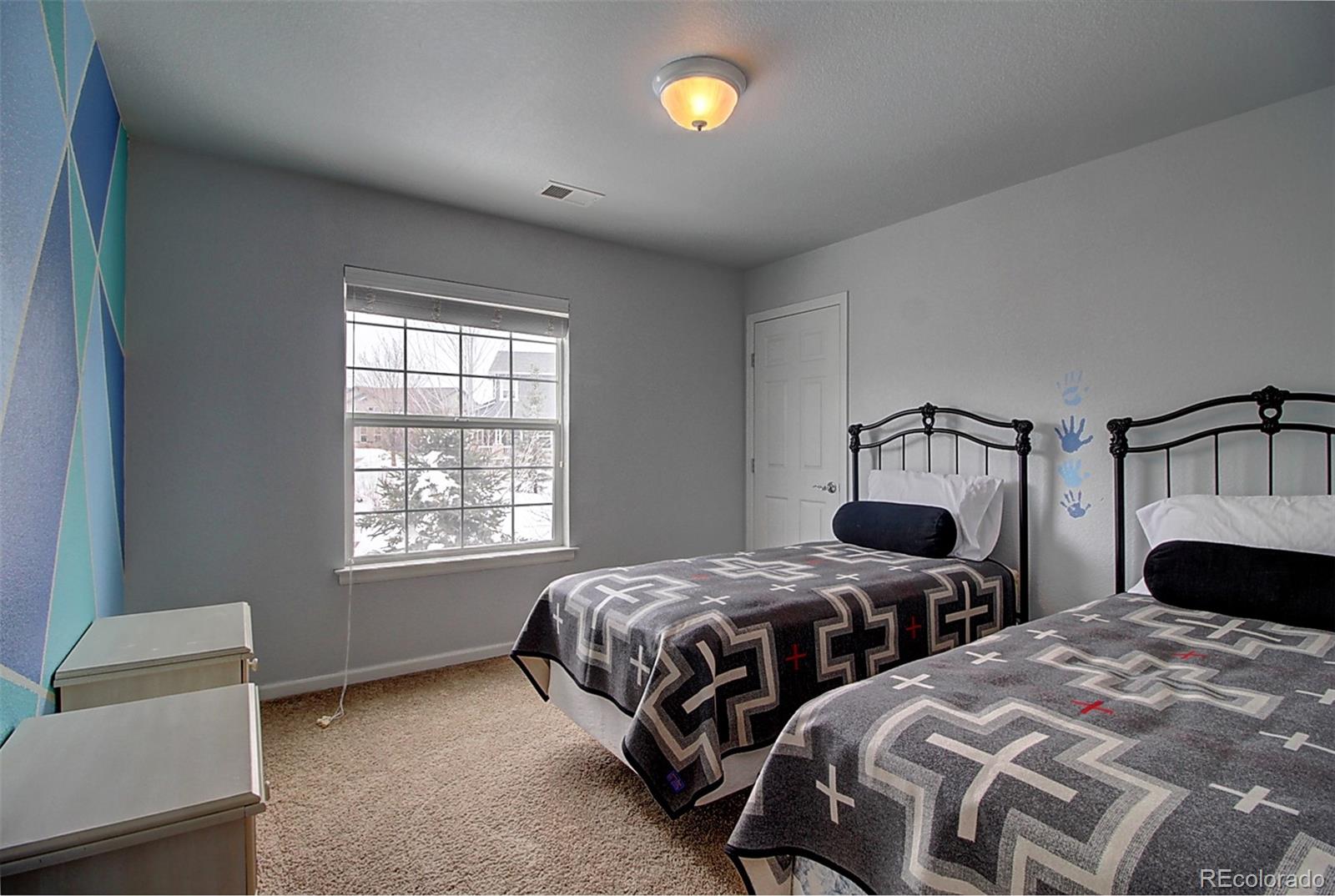 16330 Avalanche Run Broomfield, CO 80023 - Photo 33 of 39 a bedroom with two beds and a window