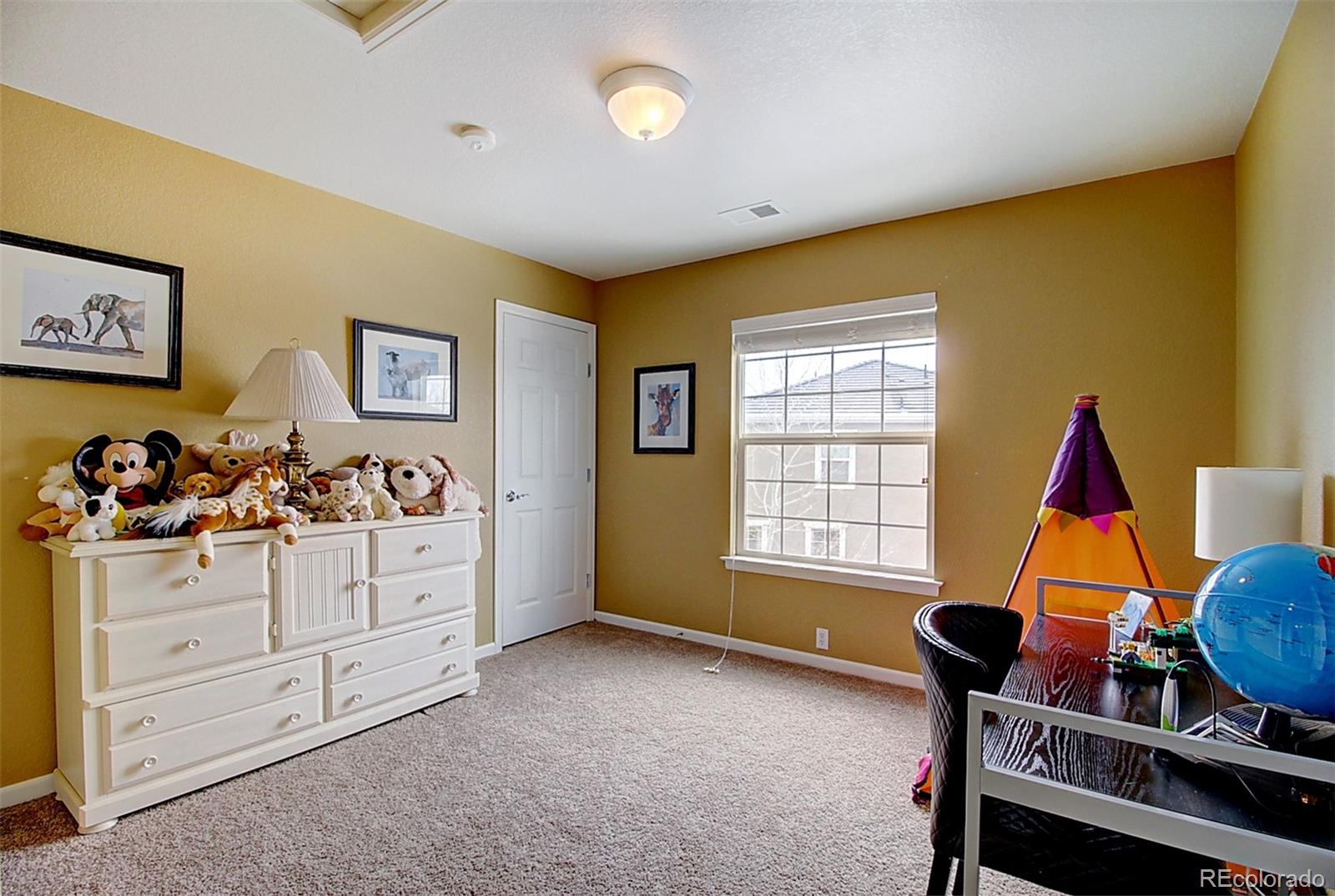 16330 Avalanche Run Broomfield, CO 80023 - Photo 36 of 39 a room with furniture and window