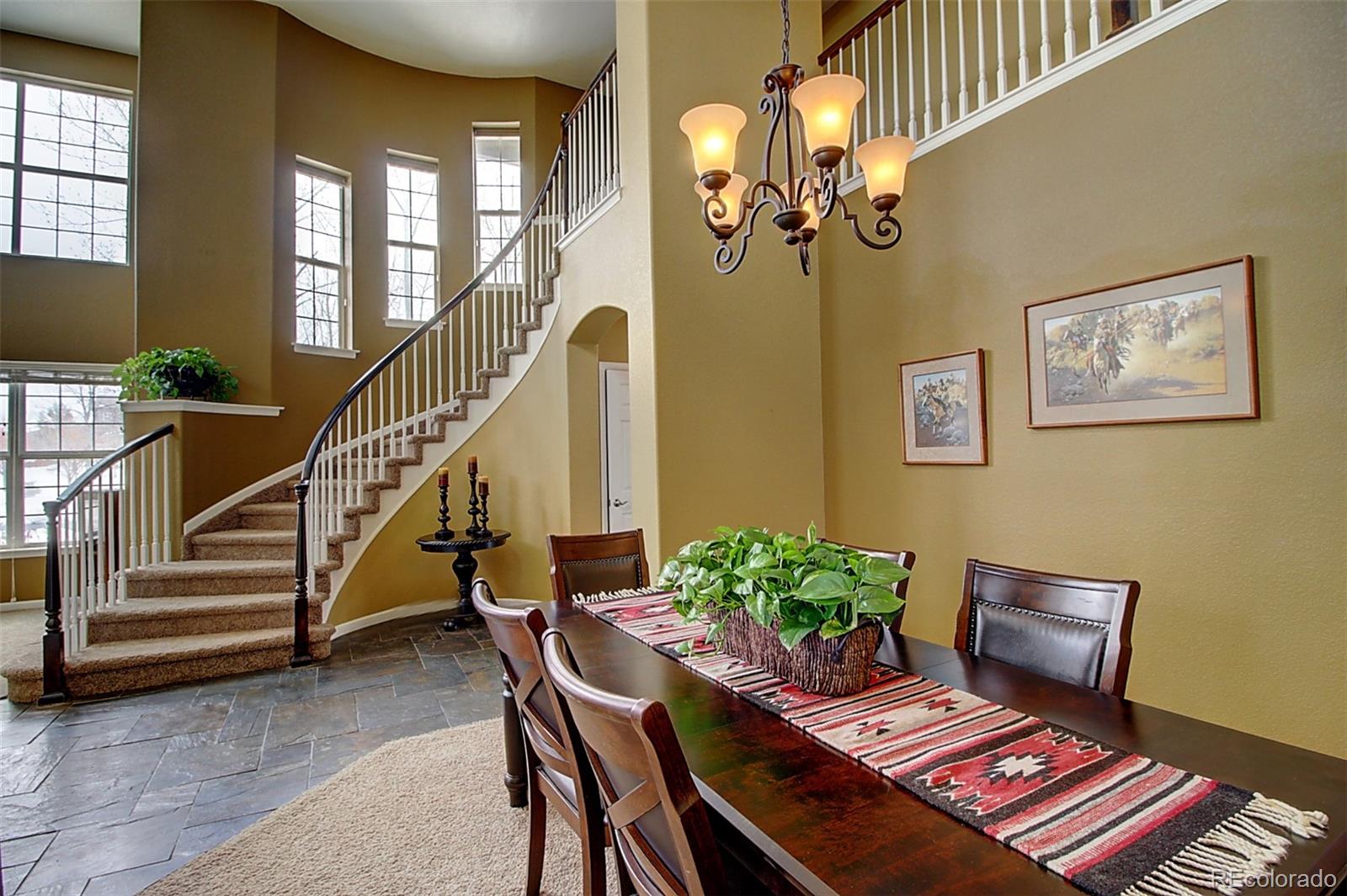 16330 Avalanche Run Broomfield, CO 80023 - Photo 6 of 39 a balcony with furniture and a potted plant