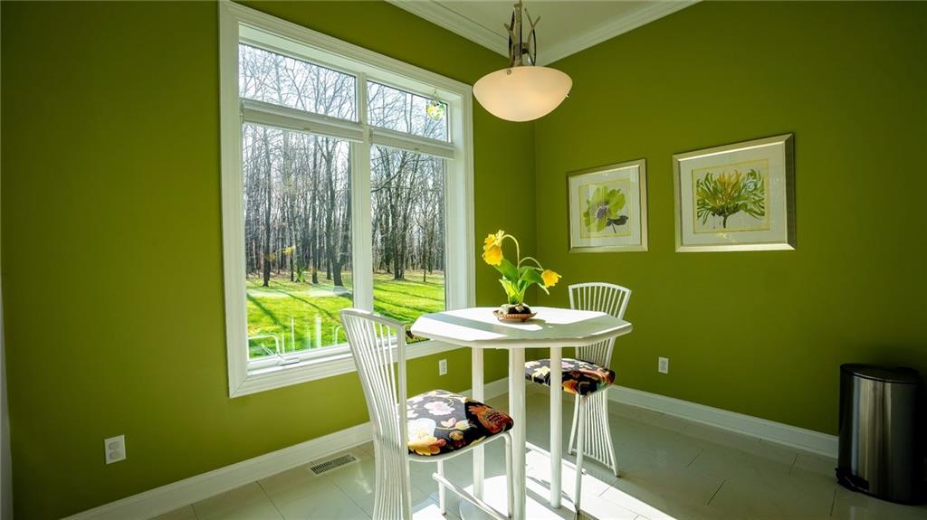 375 Old Plank Road Butler, PA 16002 - Photo 12 of 25 a view of a dining room with furniture and a window