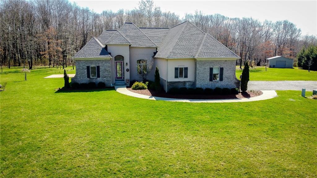375 Old Plank Road Butler, PA 16002 - Photo 2 of 25 a front view of house with yard and green space