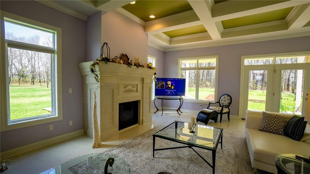 375 Old Plank Road Butler, PA 16002 - Photo 3 of 25 a living room with furniture and a fireplace
