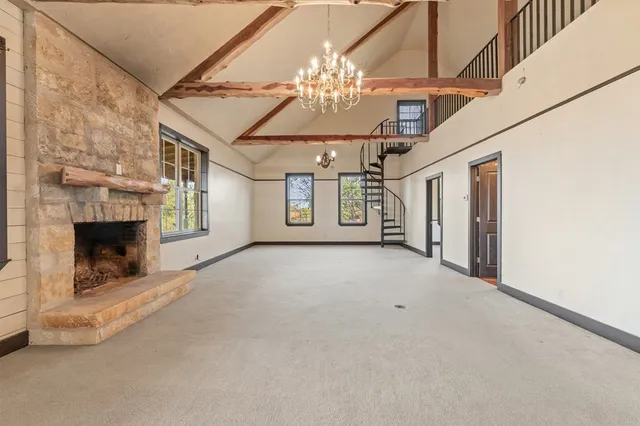 a view of empty room with windows