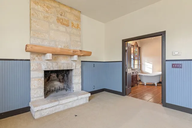 a bathroom with a double vanity sink a mirror and a shower