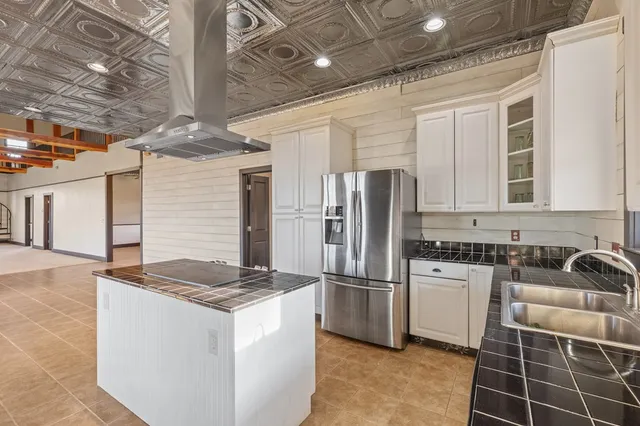 an aerial view of house with yard