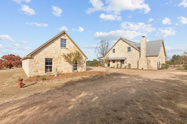 a view of a house with a snow