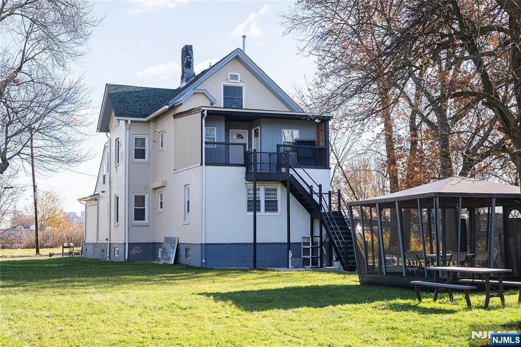 37 Riverside Avenue Little Ferry, NJ 07643 - Photo 2 of 34 a view of a house with backyard and swimming pool