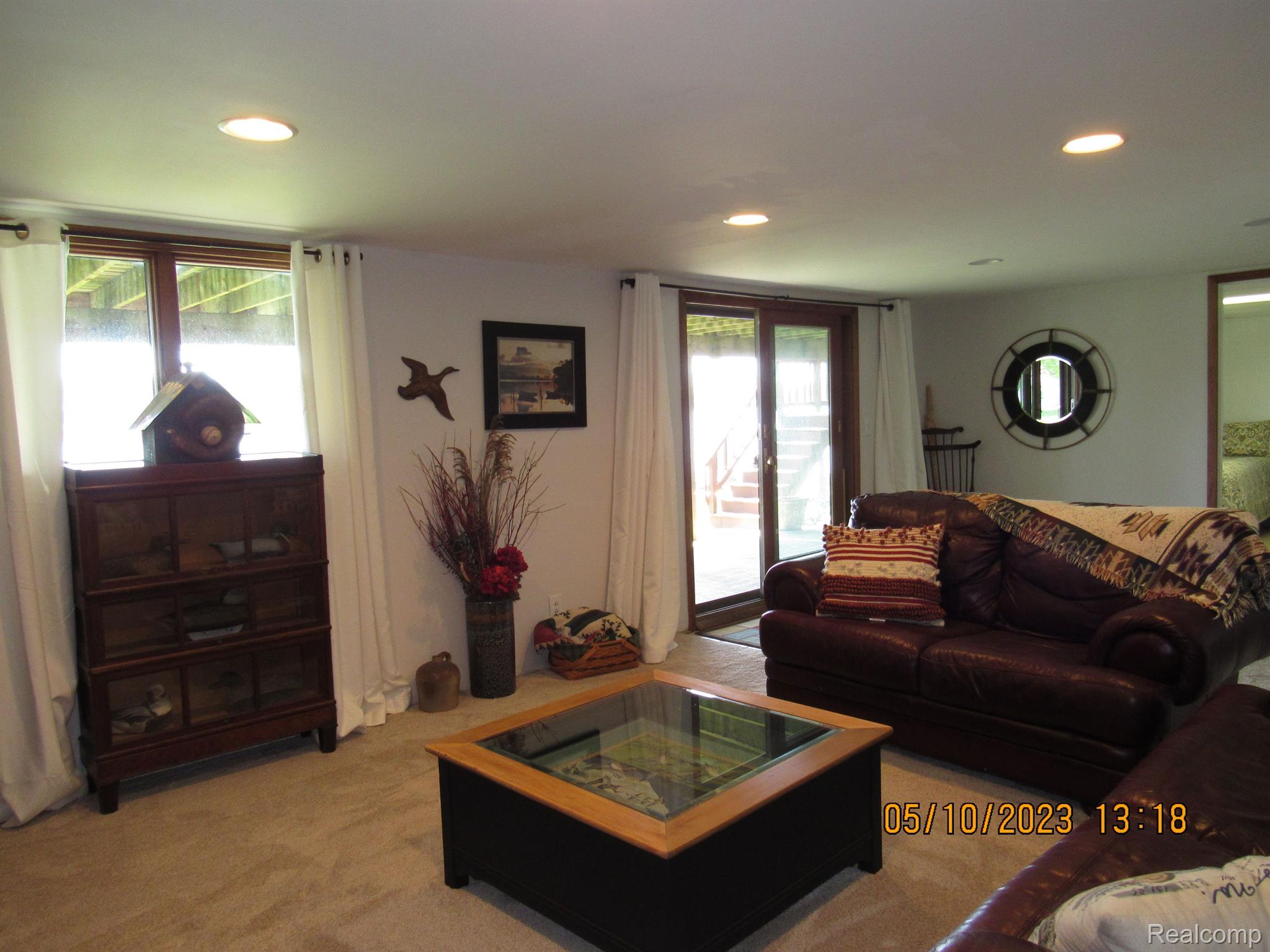 3383 East Rolston Road Fenton, MI 48430 - Photo 7 of 53 Fire lit Family Room in Lower Level Walkout