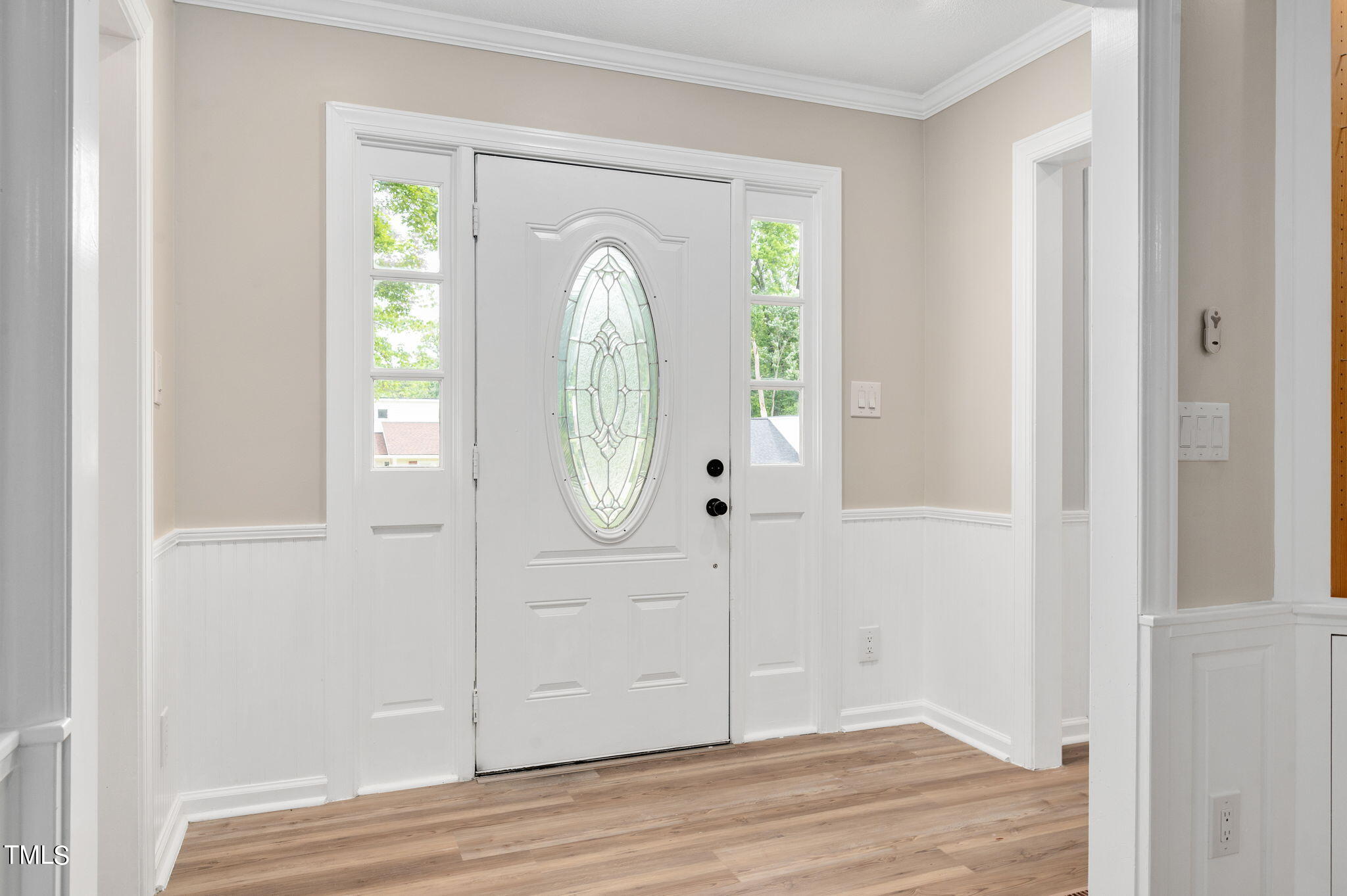 3712 Summer Place Raleigh, NC 27604 - Photo 4 of 25 an empty room with wooden floor mirror and windows