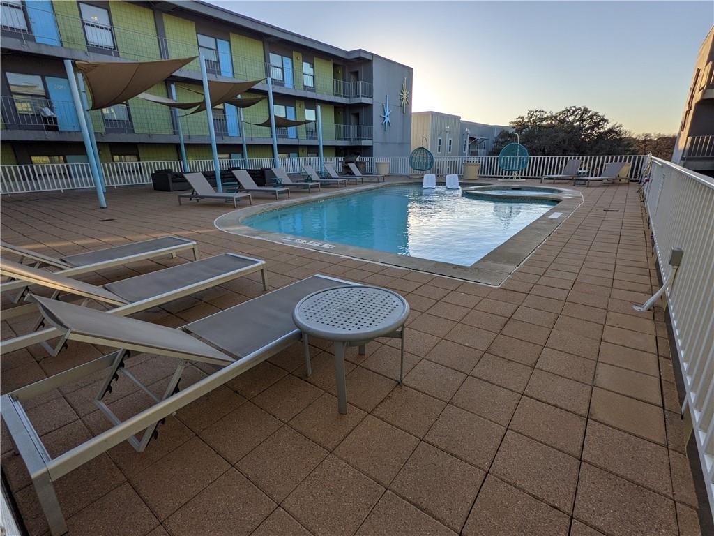 2408 Leon Street, Unit 215 Austin, TX 78705 - Photo 2 of 10 a view of a chairs and table on the terrace