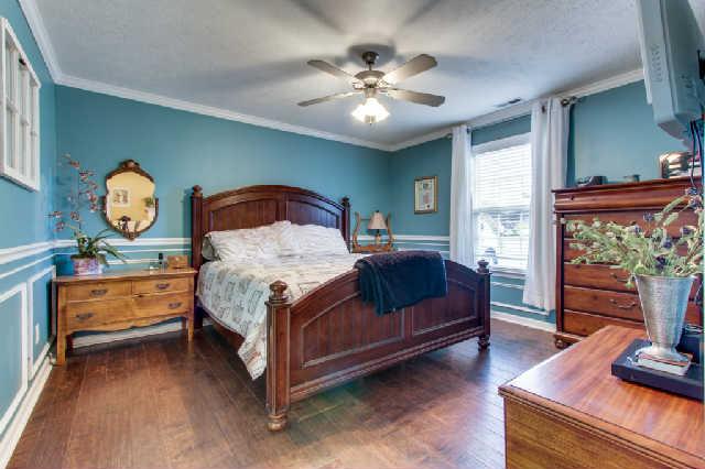 1302 Ripken Court Murfreesboro, TN 37129 - Photo 12 of 15 Great master bedroom area with natural lighting and hardwood floors!