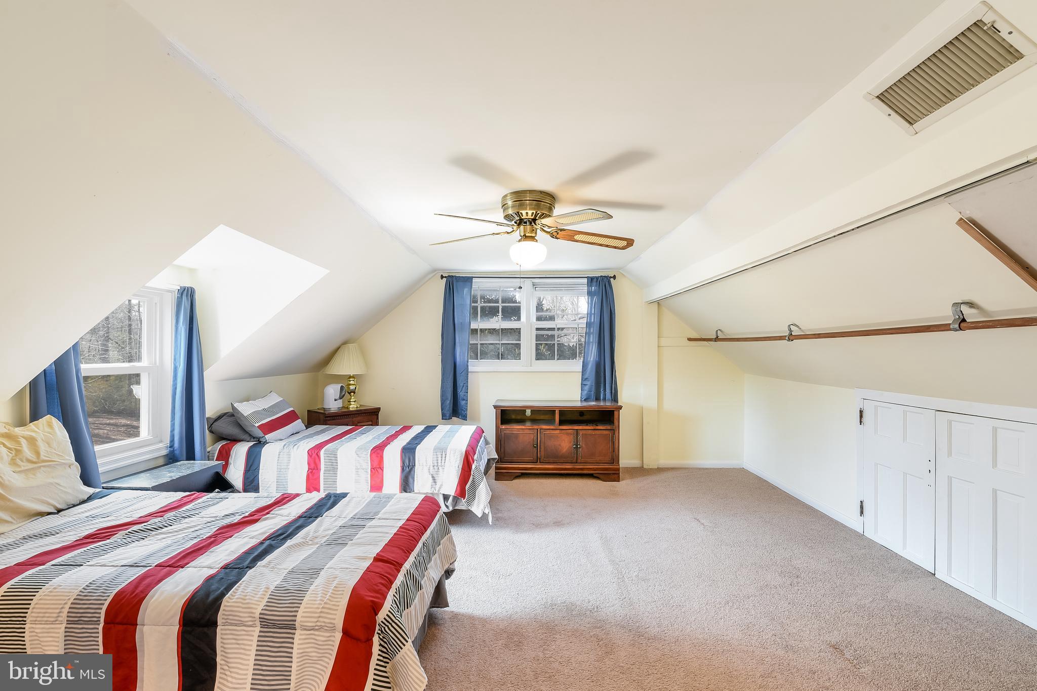 23690 West Patuxent Beach Road California, MD 20619 - Photo 18 of 39 a bed room with a bed and a window