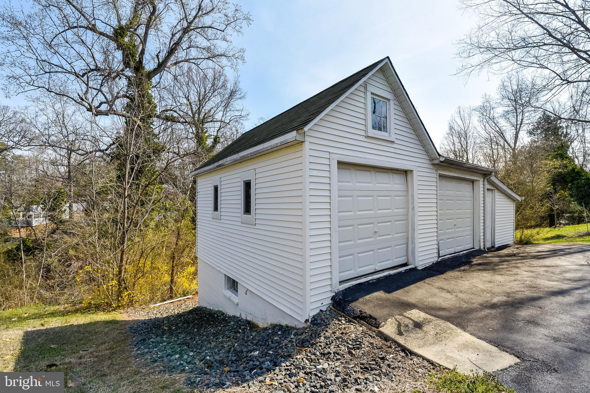 23690 West Patuxent Beach Road California, MD 20619 - Photo 7 of 39 a view of a house with a yard