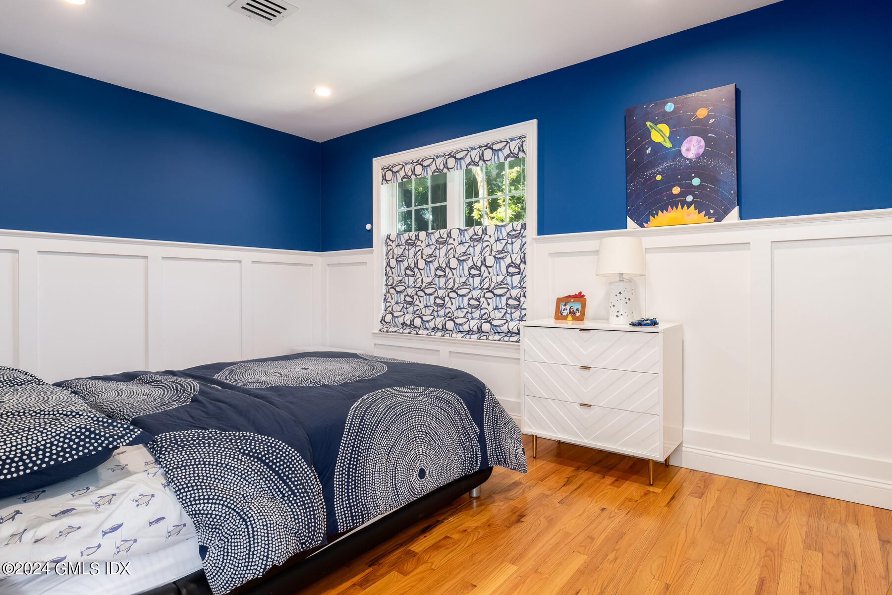 100 Strickland Road, Unit 10 Cos Cob, CT 06807 - Photo 11 of 26 a bedroom with a bed and a window