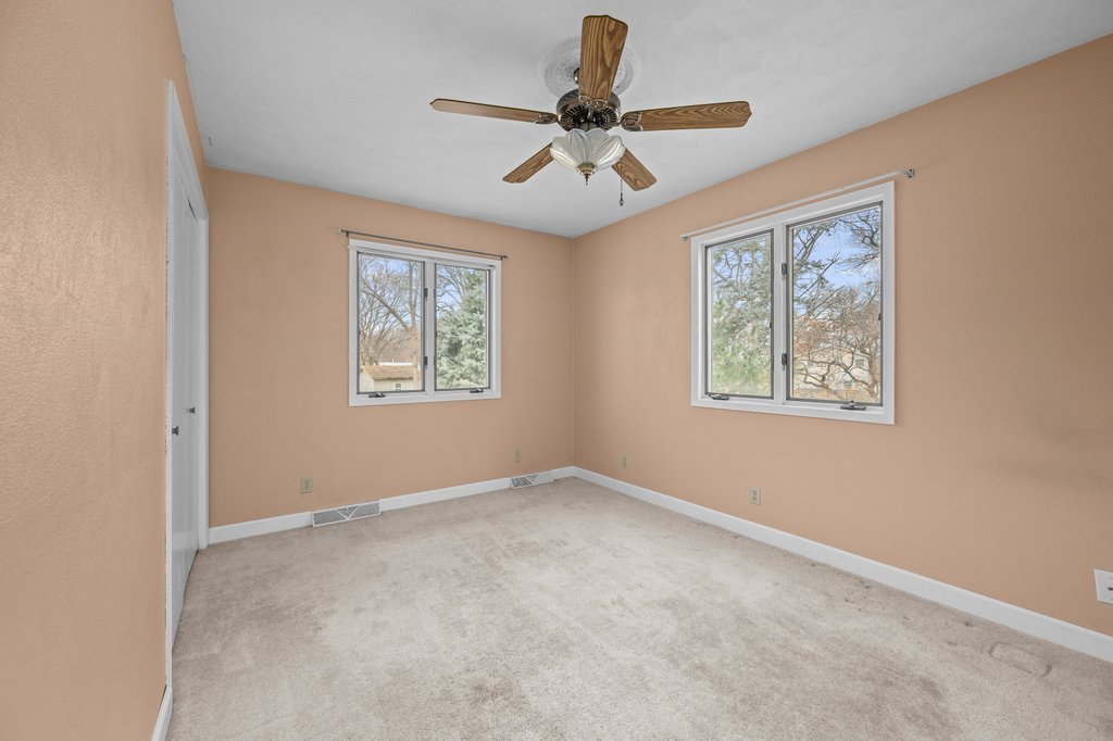 1141 Mark Street Colona, IL 61241 - Photo 16 of 29 a view of an empty room with a window