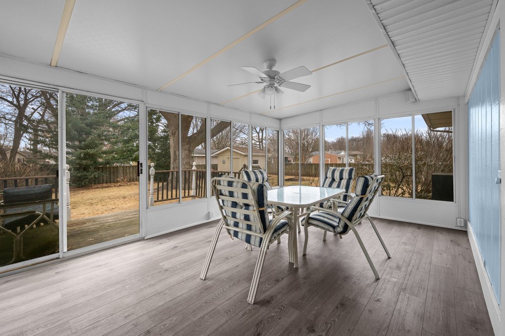 1141 Mark Street Colona, IL 61241 - Photo 21 of 29 a view of a dining room with furniture window and wooden floor