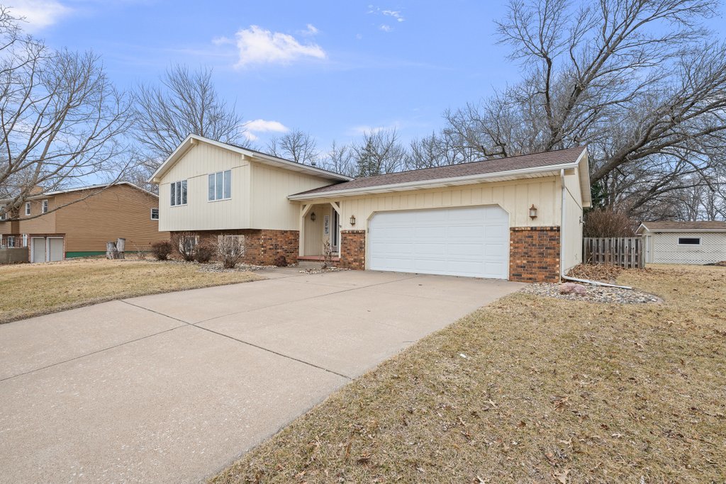 1141 Mark Street Colona, IL 61241 - Photo 3 of 29 a front view of house with yard and trees