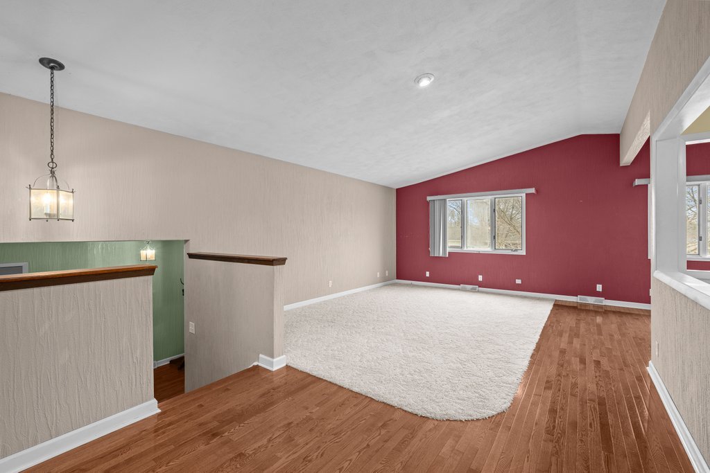 1141 Mark Street Colona, IL 61241 - Photo 7 of 29 a view of empty room with wooden floor