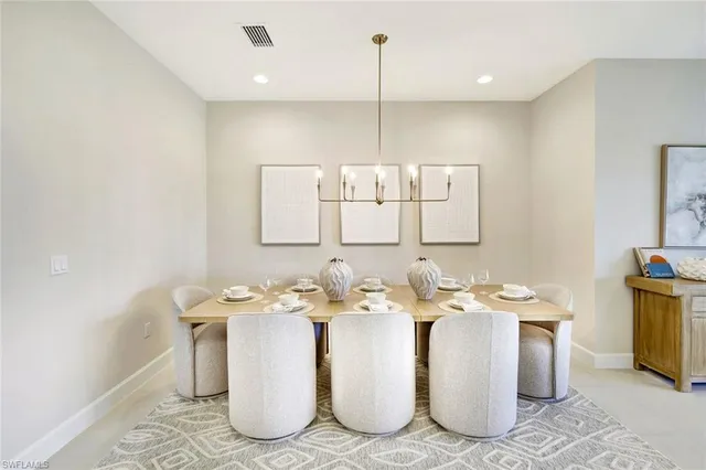 a bathroom with a sink a mirror and vanity