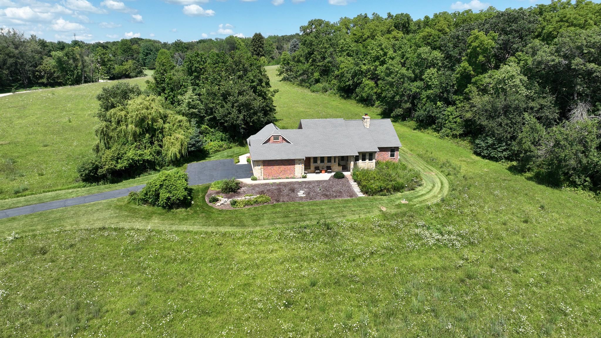 an aerial view of a house with garden