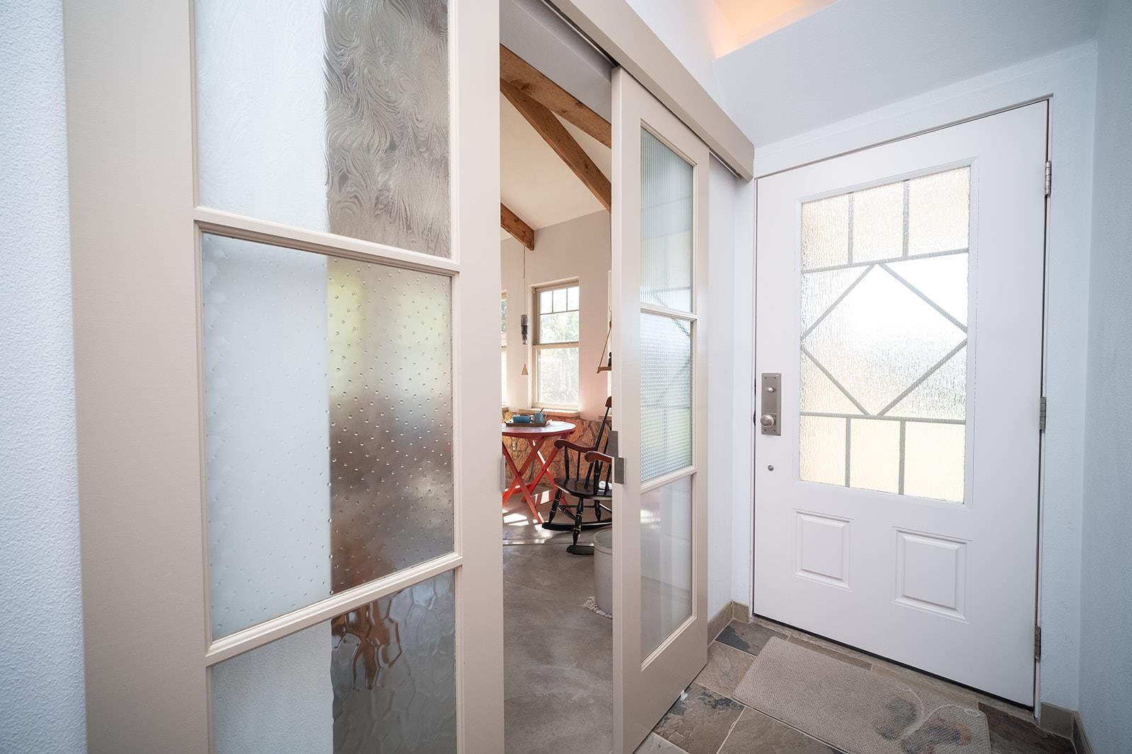 7822 Burr Oak Road Roscoe, IL 61073 - Photo 19 of 53 a view of a livingroom with wooden floor and a staircase