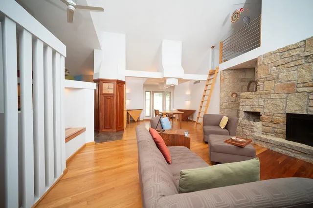 a bedroom with furniture and a window