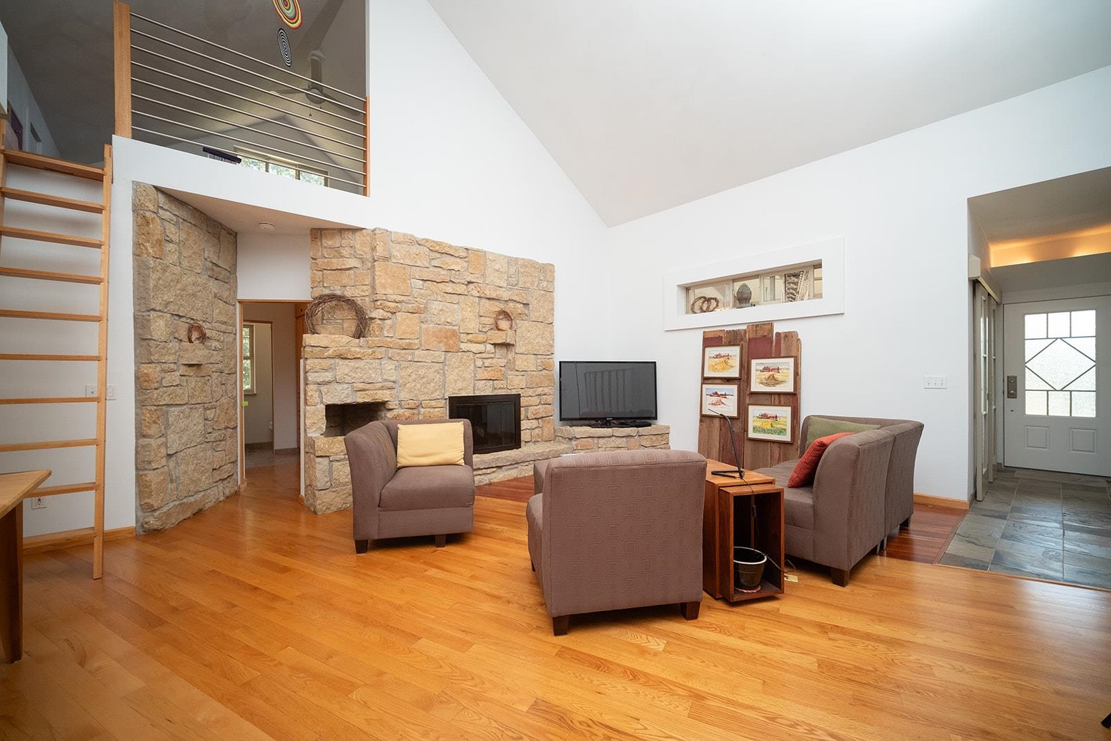 7822 Burr Oak Road Roscoe, IL 61073 - Photo 24 of 53 a living room with furniture and a flat screen tv
