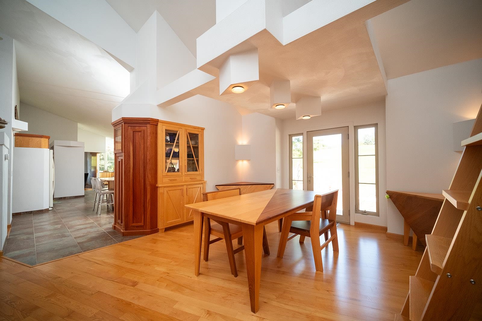 7822 Burr Oak Road Roscoe, IL 61073 - Photo 29 of 53 a dining room with wooden floor and large window
