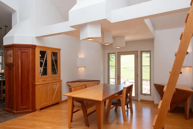 a kitchen with a stove a sink and a refrigerator